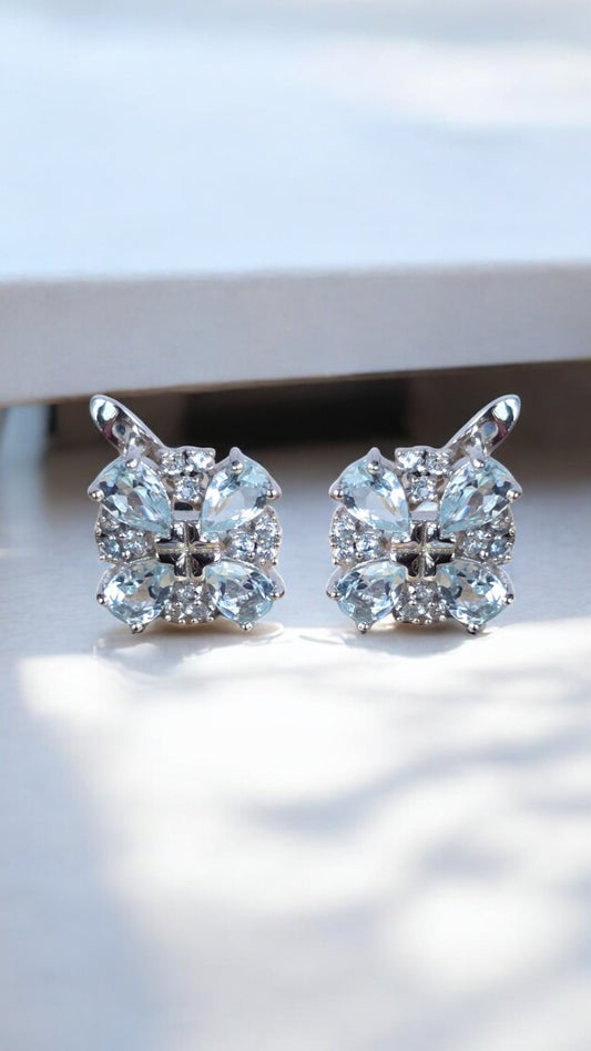 STARLIGHT– SKY BLUE TOPAZ GEMSTONE CLUSTER EARRINGS IN 925 STERLING SILVER PLATED IN RHODIUM