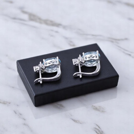 EMPRESS – NATURAL SKY BLUE TOPAZ GEMSTONE EARRINGS IN 925 STERLING SILVER