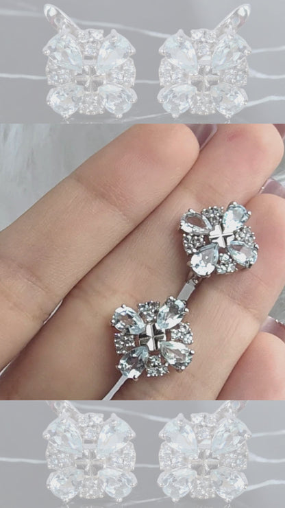 STARLIGHT– SKY BLUE TOPAZ GEMSTONE CLUSTER EARRINGS IN 925 STERLING SILVER PLATED IN RHODIUM